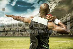 Composite image of rear view sportsman practising shot put