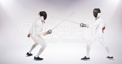 Composite image of man wearing fencing suit practicing with swor