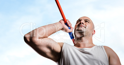 Composite image of athlete preparing to throw javelin