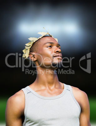 Composite image of portrait of victorious sportsman