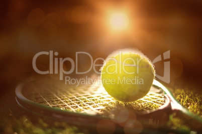 Close up of tennis ball and racket