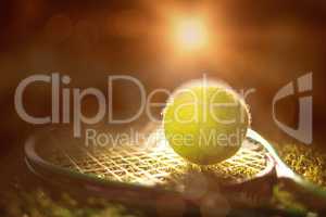 Close up of tennis ball and racket