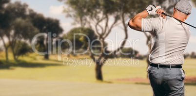 Composite image of portrait of golf player taking a shot