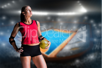 Composite image of female athlete with elbow pad holding handbal