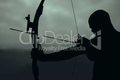 Composite image of side view of sportsman practising archery