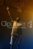 Basketball player pointing up with his finger