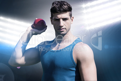 Composite image of front view of sportsman is posing and holding