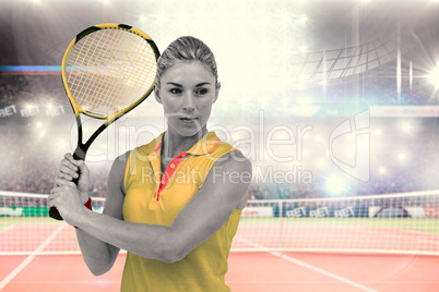 Composite image of athlete playing tennis with a racket