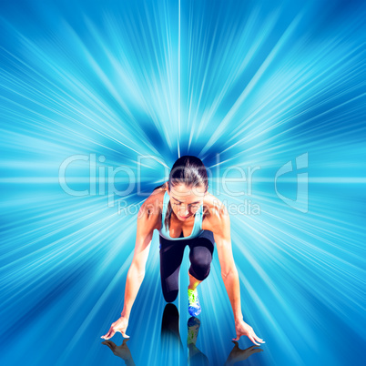 Composite image of sportswoman in the starting block