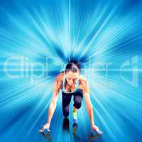 Composite image of sportswoman in the starting block