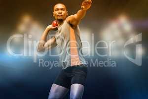 Composite image of front view of sportsman practising shot put