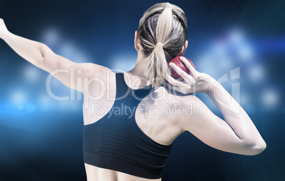 Composite image of rear view of sportswoman is practising shot p