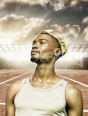 Composite image of portrait of victorious sportsman