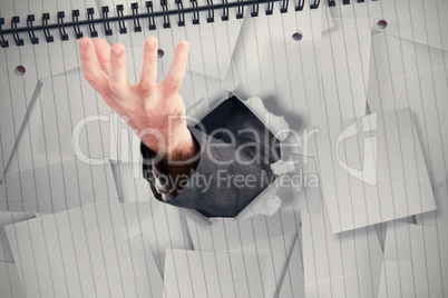 Composite image of businessman presenting with his hands