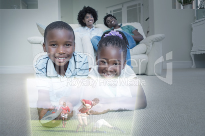 Composite image of happy sibling lying on carpet watching sport