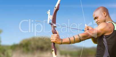 Composite image of side view of sportsman practising archery