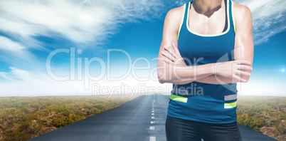 Composite image of sportswoman posing and smiling