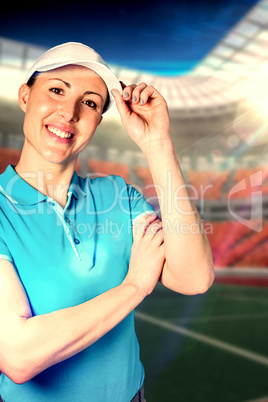 Composite image of sportswoman posing on black background