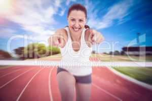 Composite image of female athlete posing on white background