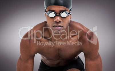 Composite image of swimmer ready to dive