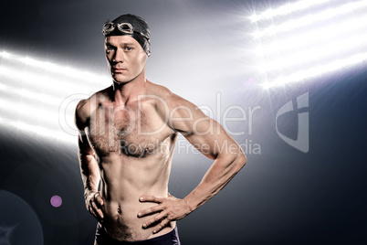 Composite image of swimmer standing with hand on hip