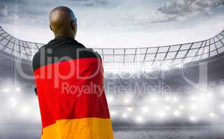 Composite image of man wearing German flag