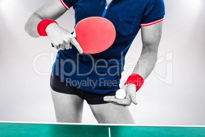 Composite image of female athlete playing ping pong