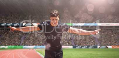 Composite image of front view of happy sportsman is running for