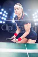 Composite image of female athlete playing ping pong