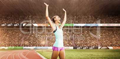 Composite image of sporty woman celebrating her victory