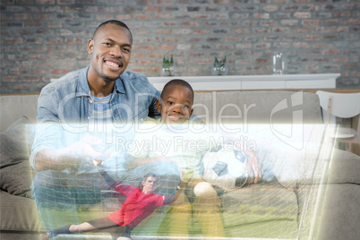 Composite image of cute father and son are posing in front of sp