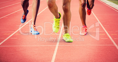 Composite image of close up of sportsman legs running