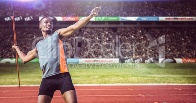 Composite image of sportsman practising the javelin throw