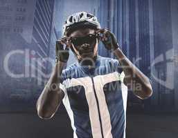 Composite image of cyclist is posing