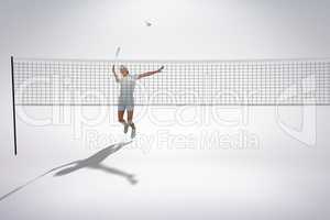 Composite image of badminton player playing badminton