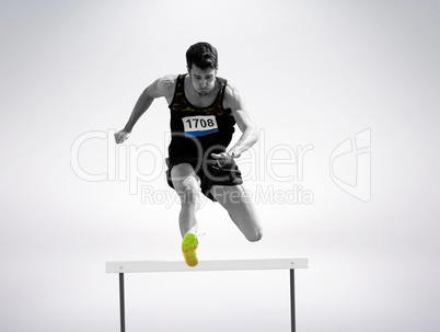 Sportsman practising hurdles