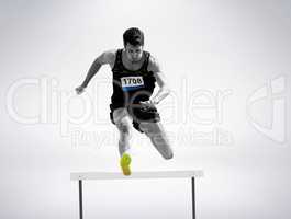 Sportsman practising hurdles