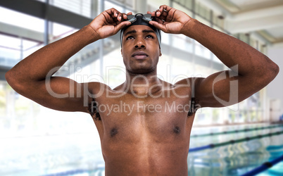 Composite image of swimmer ready to dive