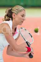 Composite image of athlete playing tennis