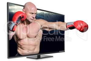 Composite image of bald boxer in fighting stance