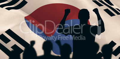Composite image of silhouettes of football supporters Composite image of silhouettes of football supporters
