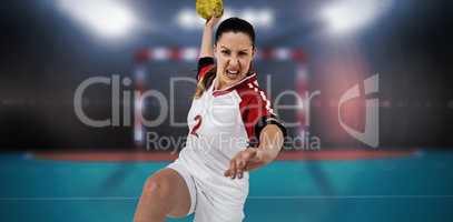 Composite image of sportswoman throwing a ball