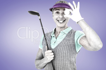 Composite image of pretty blonde playing golf