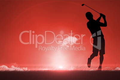 Composite image of man playing golf