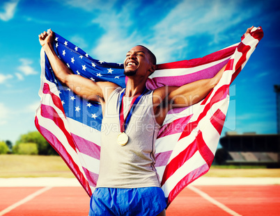 Composite image of portrait of american sportsman is smiling for