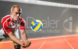 Composite image of sportsman diving while playing volleyball