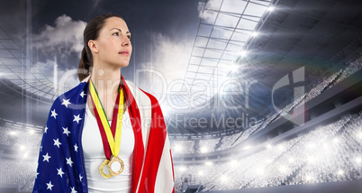 Composite image of athlete looking away with american flag and g