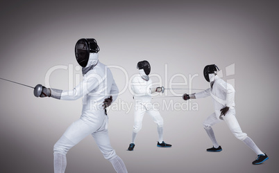 Composite image of man wearing fencing suit practicing with swor