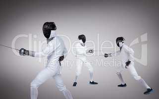 Composite image of man wearing fencing suit practicing with swor