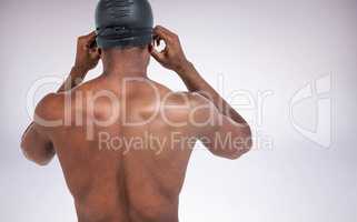 Composite image of rear view of swimmer in shirtless wearing swi